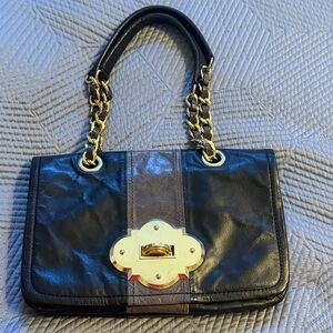 Elegant Black and Brown Leather Handbag